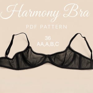 May include: Black sheer bra with delicate lace trim and adjustable straps. The bra features the text "Harmony Bra" and "PDF Pattern". The size is indicated as 36 AA, A, B, C.