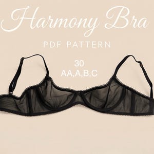 Könnte beinhalten: Schwarzer, durchsichtiger BH mit zarten Spitzendetails. Der BH hat verstellbare Träger und ist mit "Harmony Bra PDF Pattern" und Größenangaben versehen: 30 AA, A, B, C.