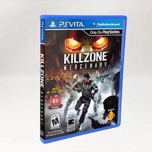 May include: A blue PS Vita game case for "Killzone: Mercenary." The cover art features a group of soldiers in combat, with the game's title in large letters. Includes "Best PS Vita Game" and "E3 2013 Winner" badges.