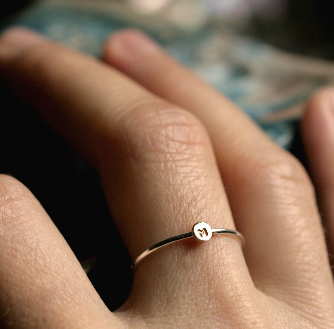 A Initial Ring Symbolism and Style