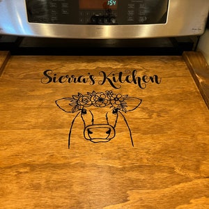 Looking for cow decorations for your kitchen? How about cow burner covers?