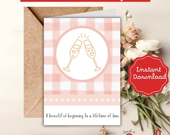 May include: A 5" x 7" printable greeting card with a pink and white gingham pattern. The card features two champagne glasses clinking, with the text "A beautiful beginning to a lifetime of love."