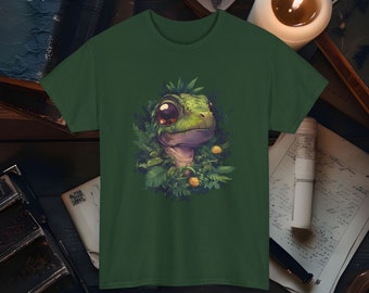 May include: Green t-shirt with a cartoon illustration of a green gecko with large eyes surrounded by green foliage.