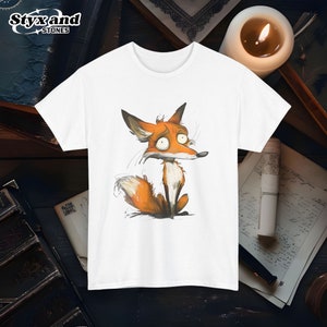 May include: White t-shirt with a cartoon illustration of a fox with a surprised expression. The fox is orange and white and has a bushy tail.