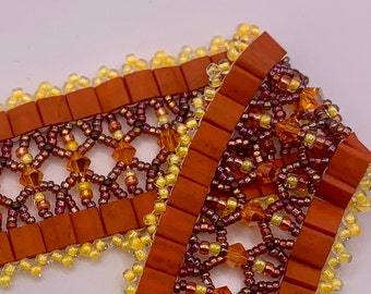 Orange and yellow bracelet featuring Swarovski crystals.