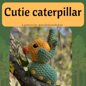 May include: A crocheted caterpillar toy in shades of orange, green, and white, perched on a tree branch. The text "Cutie caterpillar" is displayed above the image, with "A pattern by: @nerdyknotsbykari" below. The caterpillar has black eyes and orange spots.