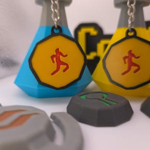 Custom 3D-Printed RuneScape Mark of Grace Keyring - Iconic Agility Accessory, Durable and Authentic Design for OSRS Fans & Collectors