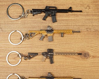 Llavero de rifle táctico, llavero para jugadores de FPS, miniatura de M4A1 inspirada en Modern Warfare, colgante para mochila Battle Royale, accesorio de regalo para fans de Milsim