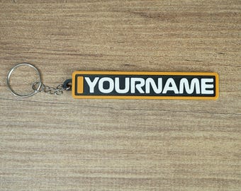 Llavero con placa de identificación estilo F1, etiqueta personalizada con los colores del equipo de automovilismo, llavero personalizado con nombre de carreras, accesorio para gamer tag, idea de regalo para aficionados a la Fórmula 1.