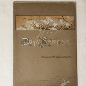May include: A vintage book titled "Days Serene" by Margaret Mac Donald Pullman. The cover features a silver embossed design of flowers and a dragonfly.