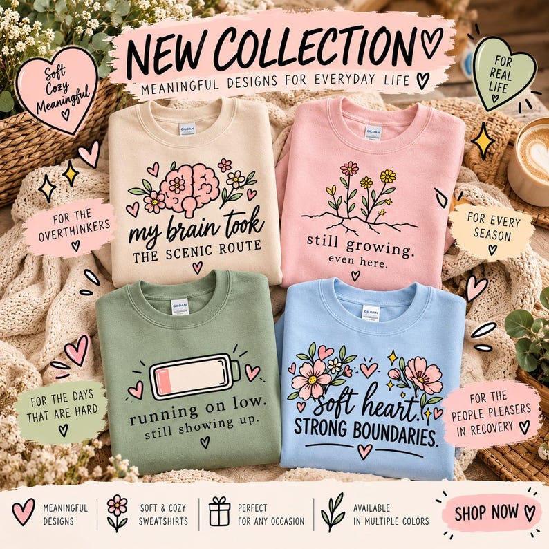 May include: Four crewneck sweatshirts in beige, pink, sage green, and light blue, each featuring unique graphic prints. The beige shirt says 'my brain took THE SCENIC ROUTE', the pink says 'still growing. even here.', the green shows a low battery icon with 'running on low. still showing up.', and the blue says 'soft heart. STRONG BOUNDARIES.'