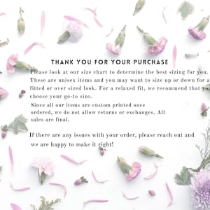 May include: A white background with scattered pink flower petals, buds, and sprigs of greenery. Text in the center reads "THANK YOU FOR YOUR PURCHASE" and provides sizing and return information for unisex items.