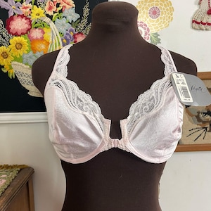 May include: A set of three ceramic nesting bowls in graduating sizes. The bowls feature a speckled, matte finish in shades of cream, beige, and brown. The largest bowl measures approximately 8 inches in diameter.