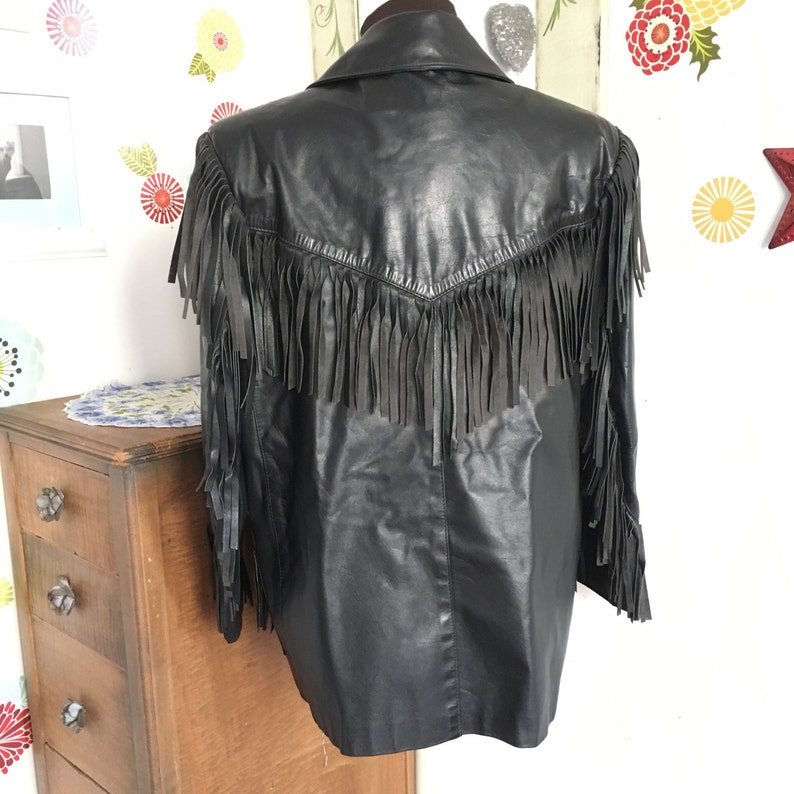 Vintage Black Leather Jacket With Fringe On Sleeves And Pockets Comint Brand Sz 12 Blazer Heavy Duty Leather Company Womens Motorcycle Jacket Black Quilted Lined Fringe L Brand Size Type Regular Style