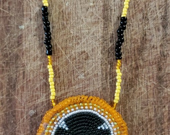 Authentic Native made, hand crafted jewelry, beadwork. Medallions, chokers, earrings, necklaces and keychains.