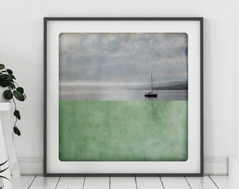 Black and white photography of a sailboat on a quite sea at sunset  with a green celadon painted color block Fine art print POLE CELADON