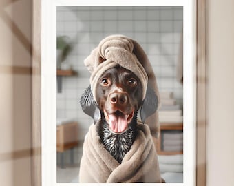 May include: A brown and white dog wearing a brown towel on its head and body. The dog is smiling and looking at the camera. The dog is in a bathroom setting with white tiles.
