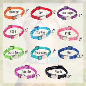 May include: A collection of colorful cat collars in various shades, including orange, red, dark purple, rose, sky blue, pink, grass green, turquoise, blue, purple, and black. Each collar has a reflective strip, a silver buckle, and a small bell.
