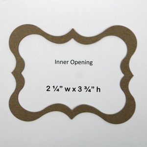 May include: A brown paper frame with a decorative, scalloped edge. The inner opening measures 2 1/4" wide by 3 3/4" high.  The text "Inner Opening" and "2 1/4" w x 3 3/4" h" is printed on the frame.