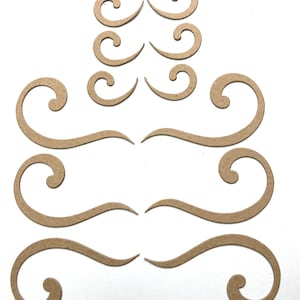 12 Piece Bare Chipboard Curled Wisp Flourish Die cuts use as wind or steam+