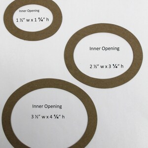 May include: Three brown cardboard circles with cut-out oval shapes. The circles are labeled with the text "Inner Opening" and the dimensions of the oval cut-out in inches. The smallest circle has a 1 1/2 inch by 1 1/2 inch opening, the middle circle has a 2 1/2 inch by 3 1/4 inch opening, and the largest circle has a 3 1/2 inch by 4 1/4 inch opening.