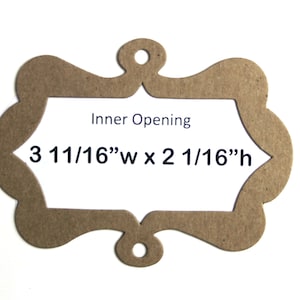 May include: A brown paper tag with a decorative scalloped edge and a hole at the top. The tag has an inner opening that measures 3 11/16" wide by 2 1/16" high.