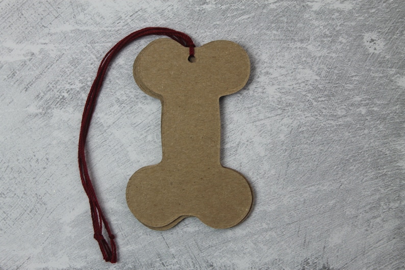 10 Dog Bone Tags SNOWFLAKE..patterned paper+chipboard tags with string attached