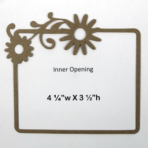May include: A brown paper frame with a floral design. The frame has an inner opening of 4 1/4" wide by 3 1/2" high.