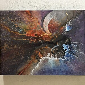 May include: Abstract artwork on canvas, featuring a dark colour palette with purple, orange, and blue hues. Gold accents and curved lines create a dynamic composition. The painting is mounted on a rectangular canvas.