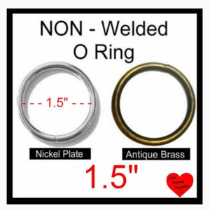 May include: Two non-welded O-rings, one in nickel plate and one in antique brass, each measuring 1.5 inches in diameter. The text reads NON-Welded O Ring, Nickel Plate, Antique Brass, and 1.5 inches, with a heart logo from Sewing Supplies.