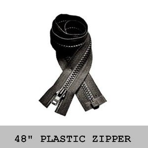 May include: A black plastic zipper measuring 48 inches in length. The zipper features a coiled design with a metal slider and pull tab at the bottom, with the text 48" PLASTIC ZIPPER displayed clearly below the coiled fastener component.