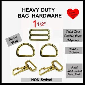 May include: Heavy duty bag hardware set featuring a 1 1/2 inch brass plated solid zinc double loop adjuster, two welded D-rings, and two fixed non-swivel snap hooks. The hardware has a metallic gold finish and is designed for bag strap construction.