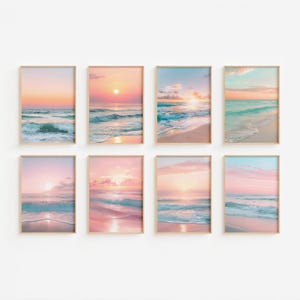 May include: Eight framed art prints featuring serene beach scenes at sunset. The artwork showcases a gradient of colors, including pink, orange, and blue, with the sun reflecting on the water. The prints are displayed against a white background.