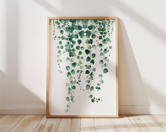 May include: A framed watercolor print of a cascading vine with green leaves. The leaves are painted in a light and airy style, giving the print a delicate and whimsical feel.