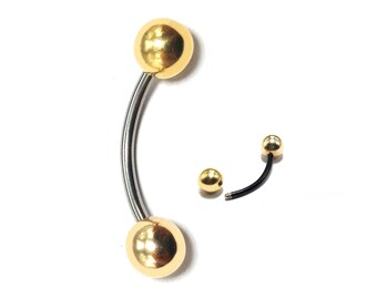 Könnte beinhalten: Ein gebogener Barbell aus Gold und Silber mit zwei goldenen Kugeln an den Enden. Der Barbell ist für Körperpiercings konzipiert.