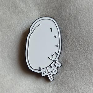 Pin de reloj inspirado en Aníbal