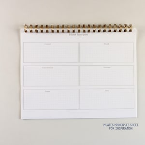 May include: A white spiral-bound notebook with gold-colored coils, featuring the text "Pilates Principles" at the top. The notebook is open, displaying six sections labeled with Pilates concepts. The text "PILATES PRINCIPLES SHEET FOR INSPIRATION" is at the bottom.
