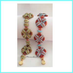 May include: Two beaded bracelets with a repeating pattern of turquoise, gold, and red beads. The bracelets are made with small, round beads and have a floral design. The text "Marinabeads" is visible on the bottom of the image.