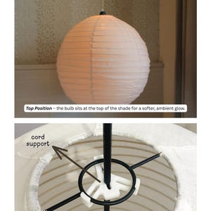 May include: A white spherical paper lantern with two bulb placement options. The top image shows the lantern illuminated. The bottom image shows a black metal frame with a white plastic cord support piece inside the paper shade structure.