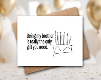 May include: A white rectangular greeting card with black text that reads, Being my brother is really the only gift you need. Next to the text is a simple black line drawing of a birthday cake topped with six lit candles. The card sits on a brown envelope.