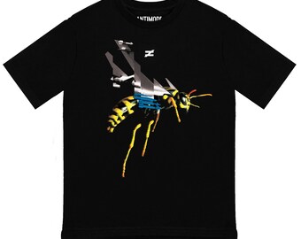 May include: Black t-shirt with a graphic of a wasp with geometric patterns and the word "ANTIMODE" printed on the front.