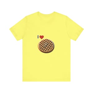 May include: Yellow t-shirt with the text "I ♥" and a picture of a waffle.