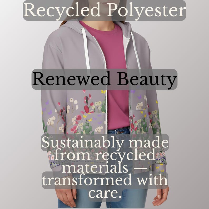 May include: A light gray zip-up hoodie with a floral pattern and the text "Recycled Polyester", "Renewed Beauty", and "Sustainably made from recycled materials - transformed with care."