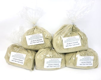 May include: Six clear plastic bags filled with light green kelp powder. Each bag has a white label that reads "1 lb KELP POWDER 100% Pure Food Grade". The bags are tied at the top with a twist tie.