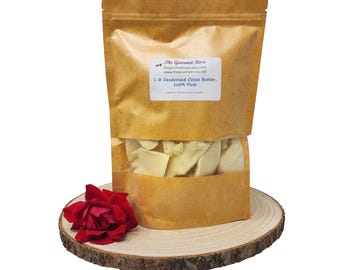 1 libra de manteca de cacao desodorizada 100% pura y natural, color amarillo dorado, ligero aroma a chocolate. Para jabón corporal o loción. Envase ecológico de 16 onzas.