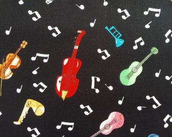Music/multicolor instruments black quilt fabric by the half yard