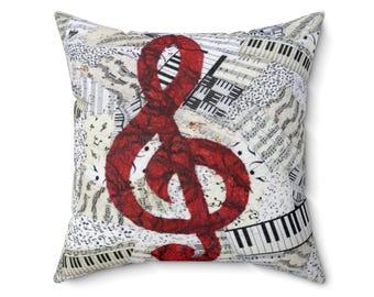 Cojín cuadrado con clave de sol roja para amantes de la música, cantantes o músicos.