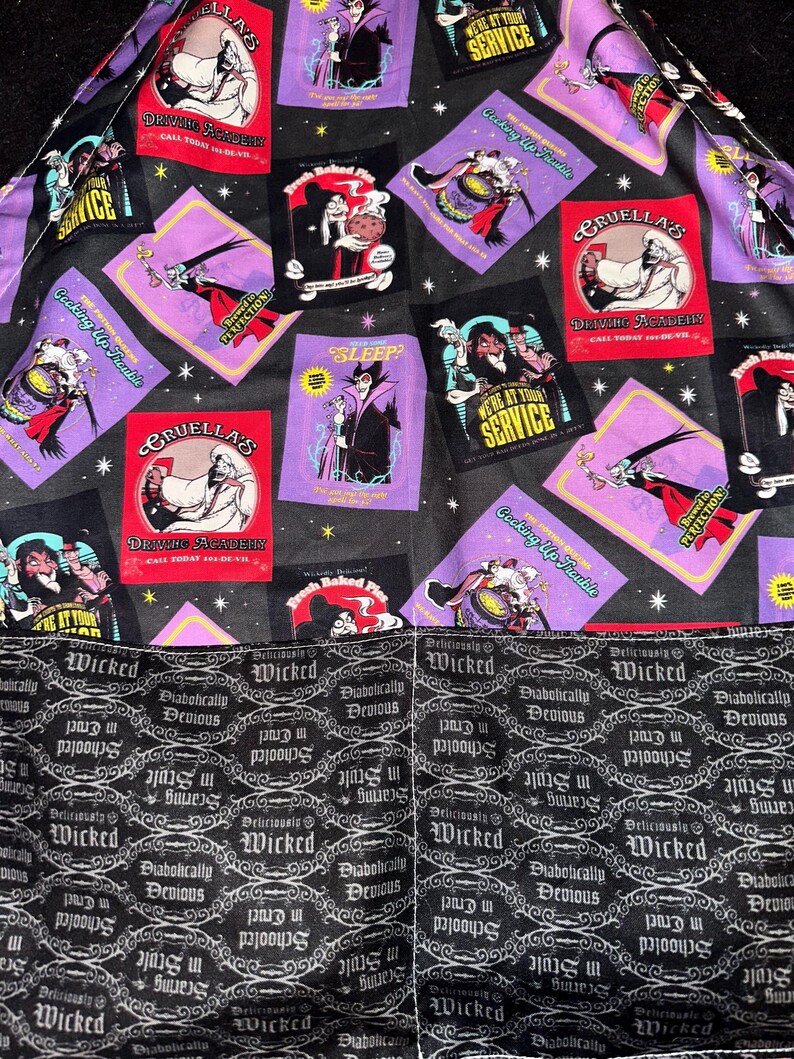 May include: Fabric featuring a repeating pattern of villainous characters from a classic animated film. The design includes images of Cruella De Vil, with text that reads "Cruella's Driving Academy" and "We're at your service". The bottom section has a black and white pattern with the words "Wicked" and "Diabolically Devious".
