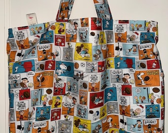 Bolso de mano hecho a mano con la imagen de Snoopy y la pandilla de Peanuts jugando a la pelota.