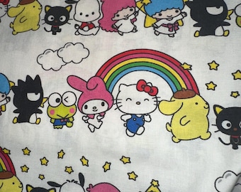 Tela de algodón de Hello Kitty y la pandilla de Sanrio, por medio metro.